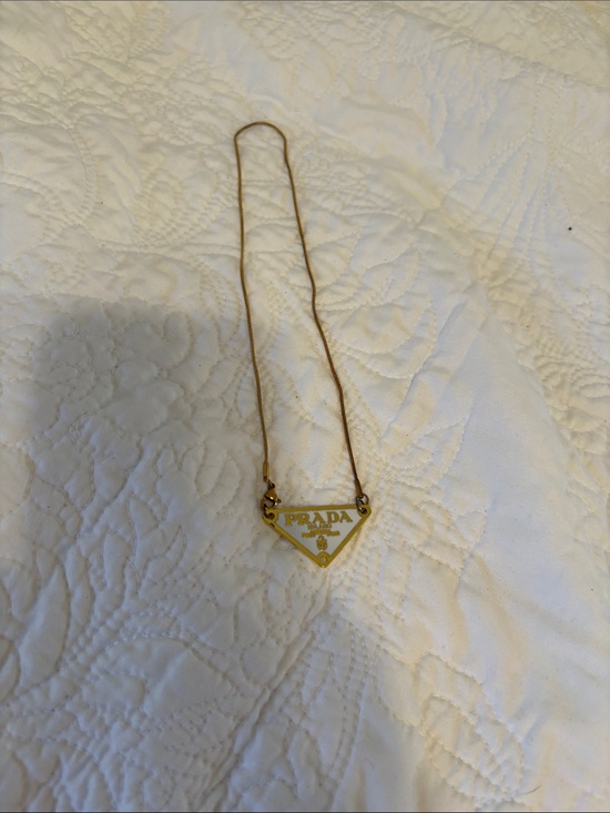 Prada Jewelry - Prada gold-tone triangle logo pendant necklace